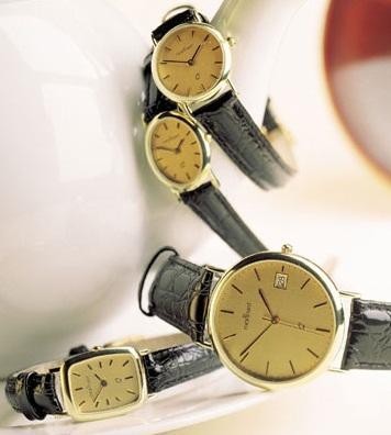 14 karaats geel gouden horloge met leren band