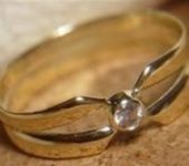 Trouwring getransformeerd met briljant geslepen diamant