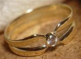 Geelgouden ring met briljant getransformeerd van trouwring