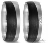 Titanium met carbon Trouwringen 8mm breed met één briljant geslepen diamant