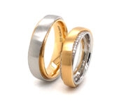 Bicolor Platina en goud Unisono trouwringen