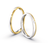 Bicolor trouwringen (witgoud en geelgoud) met diamant